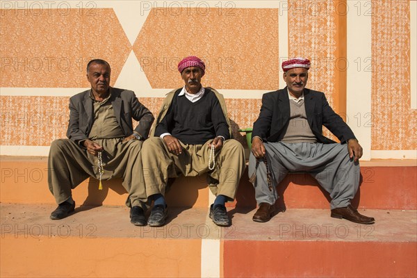 Meeting of elderly Kurdish men