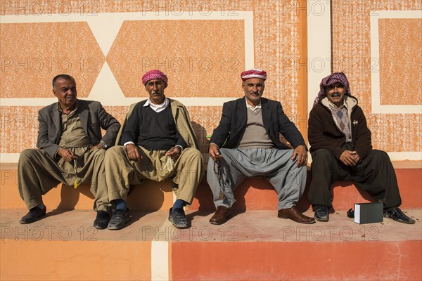 Meeting of elderly Kurdish men