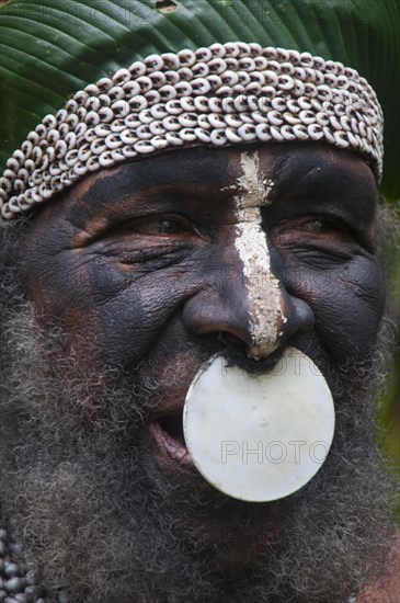 Tribal chief wearing a traditional dress