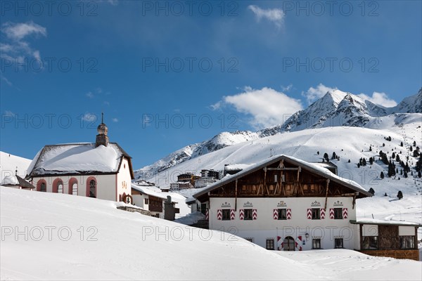 Hunting lodge and chapel in front of Gaiskogl Mountain