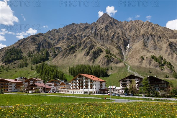 View of the village of Samnaun with Mt Piz Ot