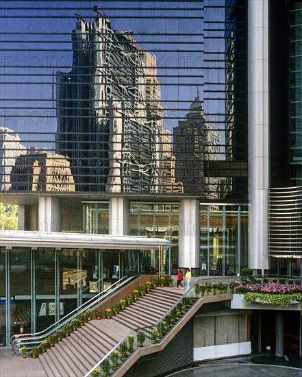 HSBC Building reflected in a glass facade