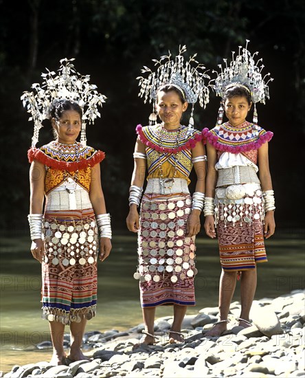Women of the ethnic group of the Iban people wearing traditional dress