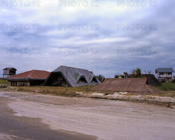 Buried houses and a school in Porac