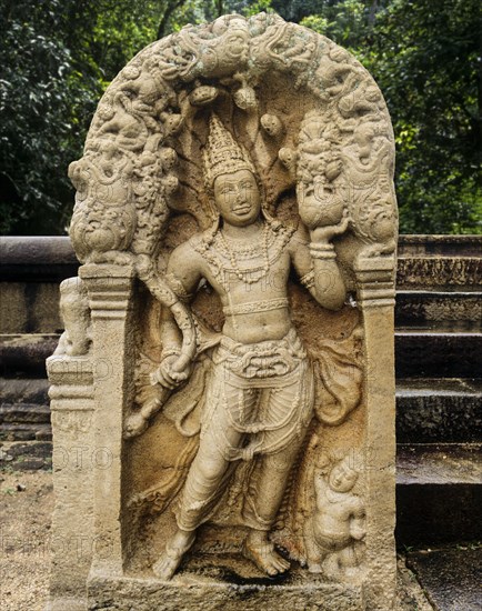 Stone guardian in front of Ratna Prasada or Jewel Palace
