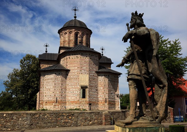 Princely Church of St Nicholas Curtea de Arges with a statue of Basarabs