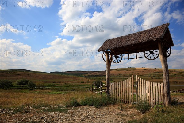 Transylvanian wooden gate at the entrance to a farm estate