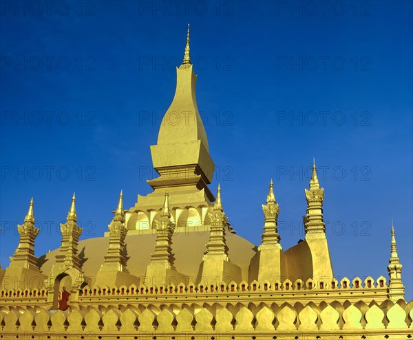 Monk on the terrace of Phra That Luang