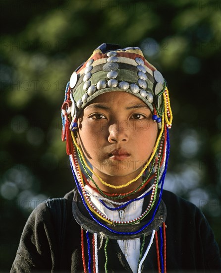 Akha girl with traditional clothing and headdress