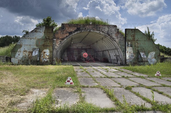 Hangar with a MIG-21 SMT aircraft