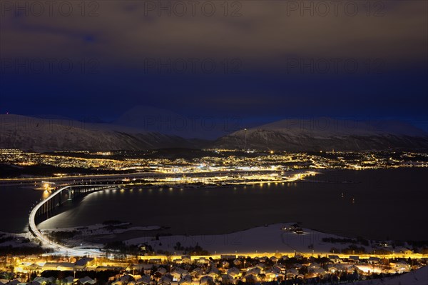 Bridge over fjord at night