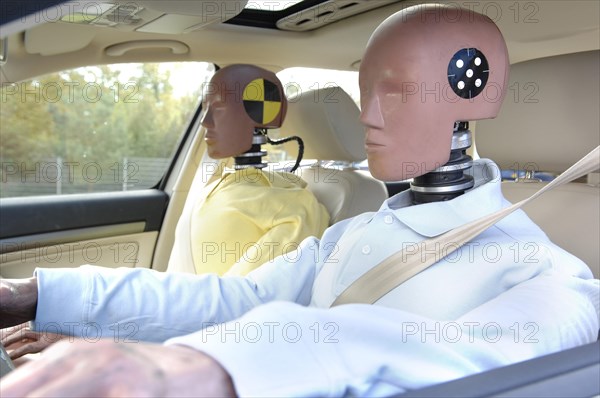 Crash test dummies in a car