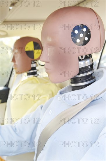 Crash test dummies in a car