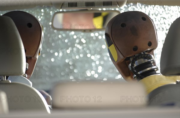 Crash test dummies in a car