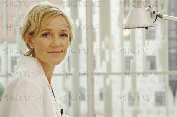 Female doctor in a white coat