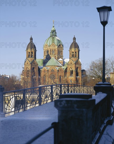 St. Luke's Church with a footbridge over the Isar River