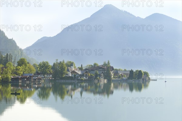 Walchensee on Lake Walchen with a fishing boat