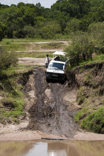 Minibus stuck in mud