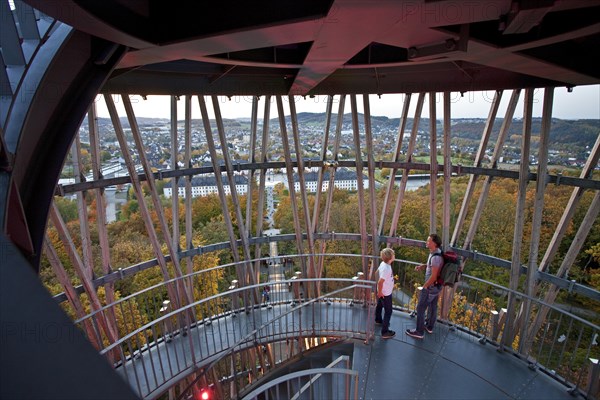 View from the staircase of the Juebergturms tower over Sauerlandpark in autumn and the city center of Hemer