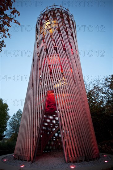 Illuminated Juebergturm tower during the Lichtgarten Sauerlandpark event