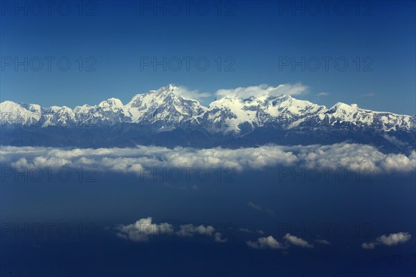 Mountain range of the Himalayas from a plane