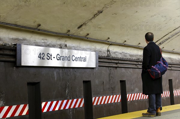 Man waiting for subway