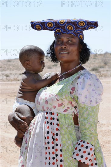 Herero woman with baby