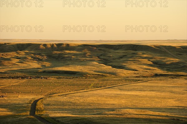 Lonely farm located in the middle of the prairie