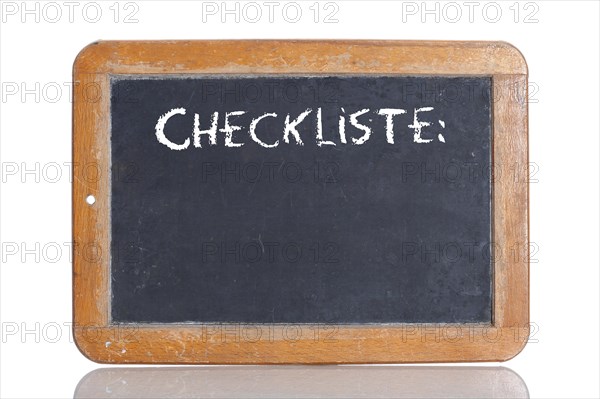 Old school blackboard with the word CHECKLISTE