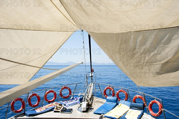 Set sail and life rings on a cruise ship in the Turkish Aegean Sea