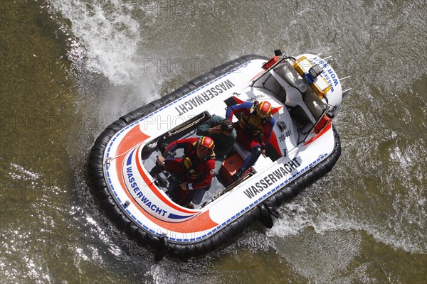 Airboat of the Wasserwacht lifeguard service during an exercise on the Isar River