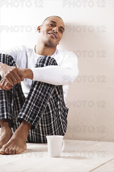 Man sitting comfortably at home