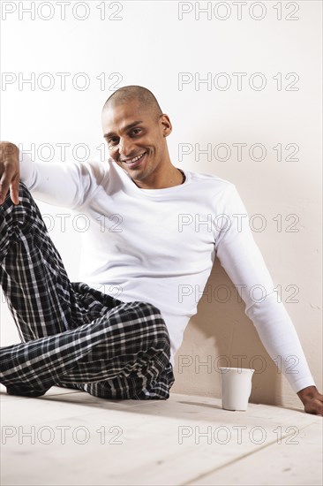 Man sitting comfortably at home