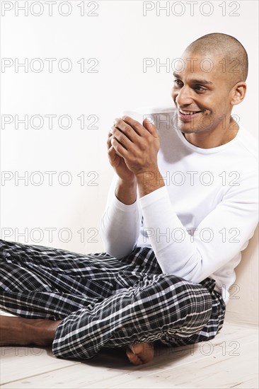 Man sitting comfortably at home