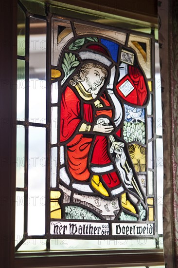 Stained glass window depicting Walther von der Vogelweide