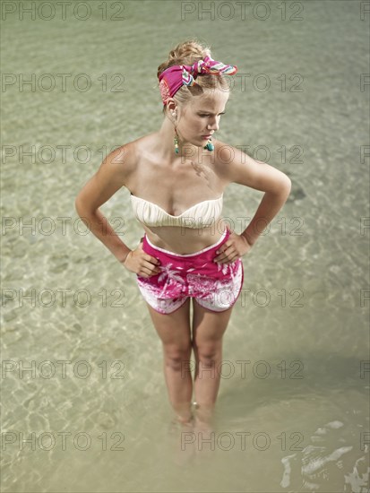 Woman standing in the water