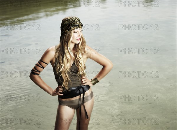 Woman standing in a lake