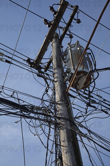 Electrical cables and telephone wires on a power pole