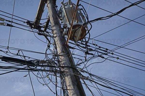 Electrical cables and telephone wires on a power pole