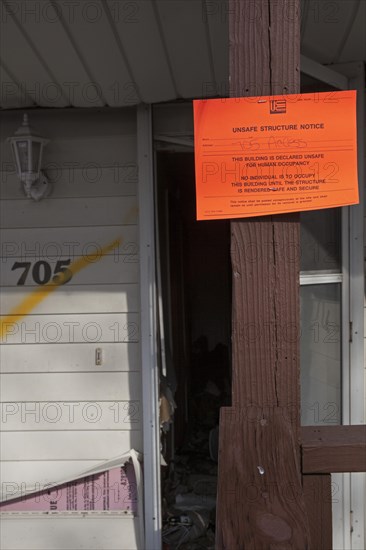 Unsafe Structure Notice on house severely damaged by Hurricane Sandy