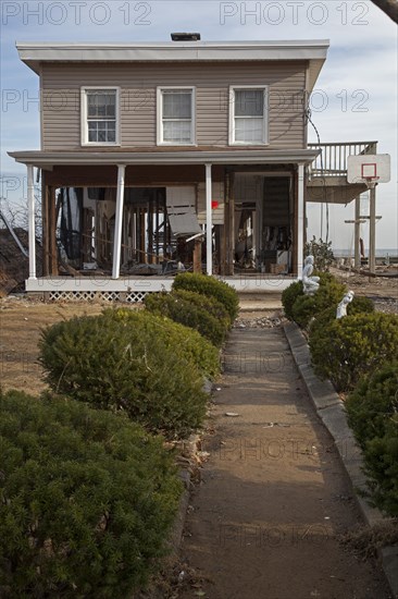 A house on the New Jersey shore severely damaged by Hurricane Sandy