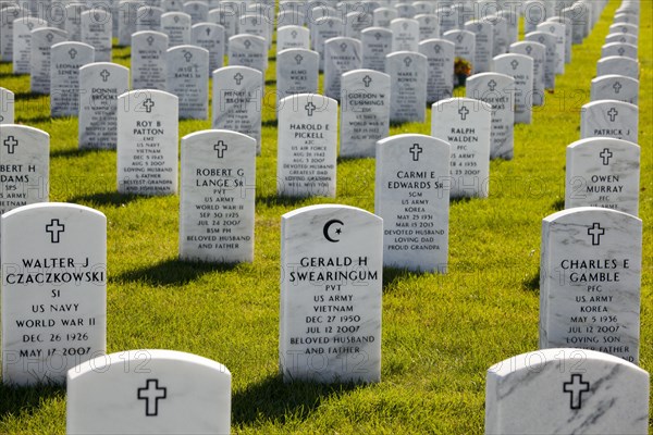 The Islamic star and crescent symbol on a tombstone