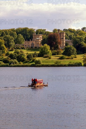 Wooden raft on Lake Glienicke in front of Schloss Babelsberg Castle