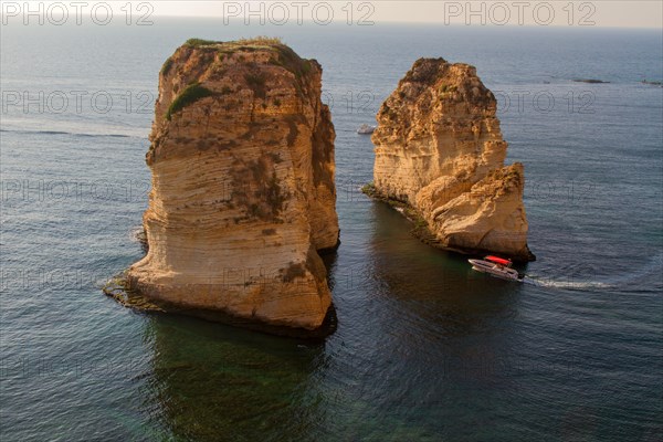 Motorboat between El Rawsheh Rock or Pigeon Rocks