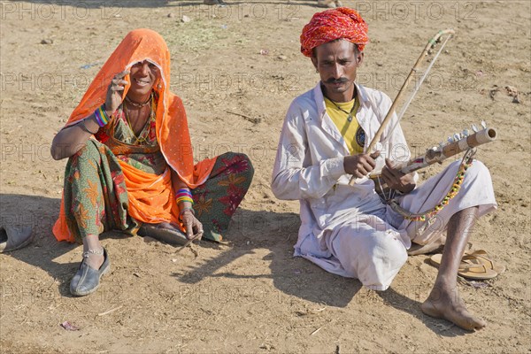 Indian men with a turban and wearing the traditional men's garment Dhoti