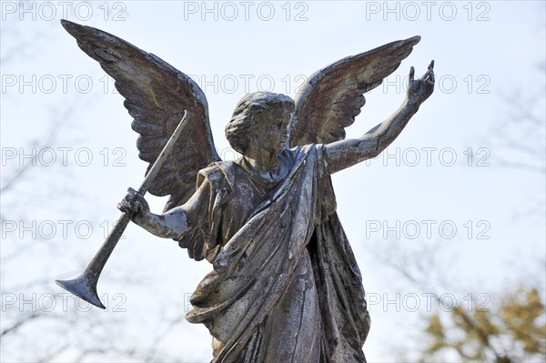 Angel statue with trumpet