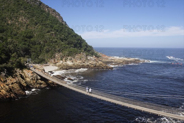 Suspension bridge over the river mouth of Storm River