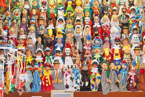 Puppets on display at a market stall in Navona Square