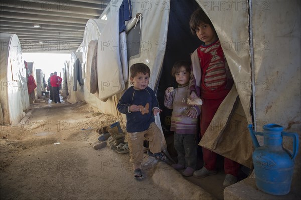 Children in a camp for Syrian refugees of the civil war near the Turkish border