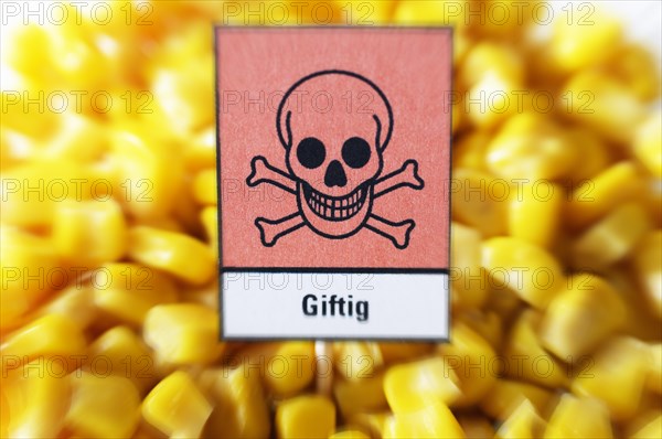 Maize kernels with a poison sign